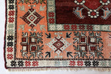 Vintage Turkish rug in a living room setting, pile rug, Turkish rug, vintage rug, portland, rug shop, bright colors, wild shaman, soft rug, bold color, Portland, Oregon, rug store, rug shop, local shop, antique rug
