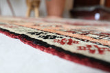 Vintage Turkish rug in a living room setting, pile rug, Turkish rug, vintage rug, portland, rug shop, bright colors, wild shaman, soft rug, bold color, Portland, Oregon, rug store, rug shop, local shop, antique rug