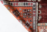 Vintage Turkish rug in a living room setting, pile rug, Turkish rug, vintage rug, portland, rug shop, bright colors, wild shaman, soft rug, bold color, Portland, Oregon, rug store, rug shop, local shop, antique rug