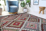 Vintage kilim rug in living room setting, bright colors, wild shaman, soft rug, bold color, Portland, Oregon, rug store, rug shop, local shop, vintage rug, modern kilim, warm colors