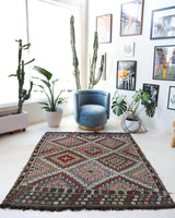 Vintage kilim rug in living room setting, bright colors, wild shaman, soft rug, bold color, Portland, Oregon, rug store, rug shop, local shop, vintage rug, modern kilim, warm colors