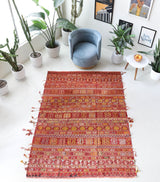 Vintage kilim rug in room decor setting, old rug, antique rug, pastel colors, faded colors, Turkish rug, vintage rug, soft rug, Portland, Oregon, rug store, rug shop, local shop, bold colors, bright colors, faded colors