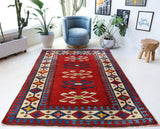 Vintage Turkish rug in a living room setting, pile rug, Turkish rug, vintage rug, portland, rug shop, bright colors, wild shaman, soft rug, bold color, Portland, Oregon, rug store, rug shop, local shop