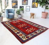 Vintage Turkish rug in a living room setting, pile rug, Turkish rug, vintage rug, portland, rug shop, bright colors, wild shaman, soft rug, bold color, Portland, Oregon, rug store, rug shop, local shop