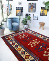 Vintage Turkish rug in a living room setting, pile rug, Turkish rug, vintage rug, portland, rug shop, bright colors, wild shaman, soft rug, bold color, Portland, Oregon, rug store, rug shop, local shop