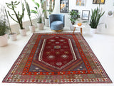 Vintage Turkish rug in a living room setting, pile rug, Turkish rug, vintage rug, portland, rug shop, bright colors, wild shaman, soft rug, bold color, Portland, Oregon, rug store, rug shop, local shop