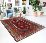 Vintage Turkish rug in a living room setting, pile rug, Turkish rug, vintage rug, portland, rug shop, bright colors, wild shaman, soft rug, bold color, Portland, Oregon, rug store, rug shop, local shop