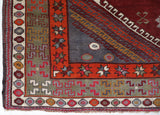 Vintage Turkish rug in a living room setting, pile rug, Turkish rug, vintage rug, portland, rug shop, bright colors, wild shaman, soft rug, bold color, Portland, Oregon, rug store, rug shop, local shop
