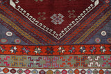 Vintage Turkish rug in a living room setting, pile rug, Turkish rug, vintage rug, portland, rug shop, bright colors, wild shaman, soft rug, bold color, Portland, Oregon, rug store, rug shop, local shop