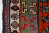 Vintage Turkish rug in a living room setting, pile rug, Turkish rug, vintage rug, portland, rug shop, bright colors, wild shaman, soft rug, bold color, Portland, Oregon, rug store, rug shop, local shop