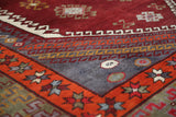 Vintage Turkish rug in a living room setting, pile rug, Turkish rug, vintage rug, portland, rug shop, bright colors, wild shaman, soft rug, bold color, Portland, Oregon, rug store, rug shop, local shop