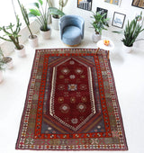 Vintage Turkish rug in a living room setting, pile rug, Turkish rug, vintage rug, portland, rug shop, bright colors, wild shaman, soft rug, bold color, Portland, Oregon, rug store, rug shop, local shop