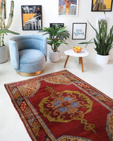 Vintage Turkish rug in a living room setting, pile rug, Turkish rug, vintage rug, portland, rug shop, bright colors, wild shaman, soft rug, bold color, Portland, Oregon, rug store, rug shop, local shop, antique rug