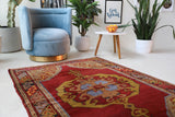 Vintage Turkish rug in a living room setting, pile rug, Turkish rug, vintage rug, portland, rug shop, bright colors, wild shaman, soft rug, bold color, Portland, Oregon, rug store, rug shop, local shop, antique rug