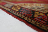 Vintage Turkish rug in a living room setting, pile rug, Turkish rug, vintage rug, portland, rug shop, bright colors, wild shaman, soft rug, bold color, Portland, Oregon, rug store, rug shop, local shop, antique rug