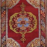 Vintage Turkish rug in a living room setting, pile rug, Turkish rug, vintage rug, portland, rug shop, bright colors, wild shaman, soft rug, bold color, Portland, Oregon, rug store, rug shop, local shop, antique rug