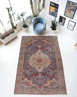 Vintage Turkish rug in a living room setting, pile rug, Turkish rug, vintage rug, portland, rug shop, bright colors, wild shaman, soft rug, bold color, Portland, Oregon, rug store, rug shop, local shop