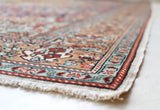 Vintage Turkish rug in a living room setting, pile rug, Turkish rug, vintage rug, portland, rug shop, bright colors, wild shaman, soft rug, bold color, Portland, Oregon, rug store, rug shop, local shop