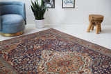 Vintage Turkish rug in a living room setting, pile rug, Turkish rug, vintage rug, portland, rug shop, bright colors, wild shaman, soft rug, bold color, Portland, Oregon, rug store, rug shop, local shop