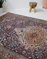 Vintage Turkish rug in a living room setting, pile rug, Turkish rug, vintage rug, portland, rug shop, bright colors, wild shaman, soft rug, bold color, Portland, Oregon, rug store, rug shop, local shop