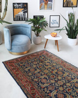 Vintage Turkish rug in a living room setting, pile rug, Turkish rug, vintage rug, portland, rug shop, bright colors, wild shaman, soft rug, bold color, Portland, Oregon, rug store, rug shop, local shop, antique rug