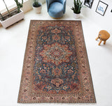 Vintage Turkish rug in a living room setting, pile rug, Turkish rug, vintage rug, portland, rug shop, bright colors, wild shaman, soft rug, bold color, Portland, Oregon, rug store, rug shop, local shop