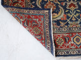 Vintage Turkish rug in a living room setting, pile rug, Turkish rug, vintage rug, portland, rug shop, bright colors, wild shaman, soft rug, bold color, Portland, Oregon, rug store, rug shop, local shop, antique rug