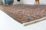 Vintage Turkish rug in a living room setting, pile rug, Turkish rug, vintage rug, portland, rug shop, bright colors, wild shaman, soft rug, bold color, Portland, Oregon, rug store, rug shop, local shop