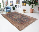 Vintage Turkish rug in a living room setting, pile rug, Turkish rug, vintage rug, portland, rug shop, bright colors, wild shaman, soft rug, bold color, Portland, Oregon, rug store, rug shop, local shop