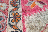 Vintage Turkish runner rug in a living room setting, pile rug, Turkish rug, vintage rug, portland, rug shop, bright colors, wild shaman, soft rug, bold color, Portland, Oregon, rug store, rug shop, local shop