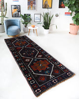Vintage Turkish runner rug in a living room setting, pile rug, Turkish rug, vintage rug, portland, rug shop, bright colors, wild shaman, soft rug, bold color, Portland, Oregon, rug store, rug shop, local shop