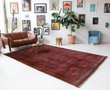 Antique Turkmen rug in a living room setting, pile rug, Turkish rug, vintage rug, portland, rug shop, bright colors, wild shaman, soft rug, bold color, Portland, Oregon, rug store, rug shop, local shop, antique rug
