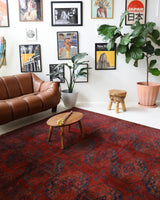 Antique Turkmen rug in a living room setting, pile rug, Turkish rug, vintage rug, portland, rug shop, bright colors, wild shaman, soft rug, bold color, Portland, Oregon, rug store, rug shop, local shop, antique rug