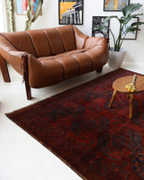 Antique Turkmen rug in a living room setting, pile rug, Turkish rug, vintage rug, portland, rug shop, bright colors, wild shaman, soft rug, bold color, Portland, Oregon, rug store, rug shop, local shop, antique rug