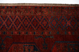 Antique Turkmen rug in a living room setting, pile rug, Turkish rug, vintage rug, portland, rug shop, bright colors, wild shaman, soft rug, bold color, Portland, Oregon, rug store, rug shop, local shop, antique rug