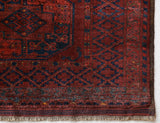 Antique Turkmen rug in a living room setting, pile rug, Turkish rug, vintage rug, portland, rug shop, bright colors, wild shaman, soft rug, bold color, Portland, Oregon, rug store, rug shop, local shop, antique rug