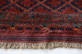 Antique Turkmen rug in a living room setting, pile rug, Turkish rug, vintage rug, portland, rug shop, bright colors, wild shaman, soft rug, bold color, Portland, Oregon, rug store, rug shop, local shop, antique rug