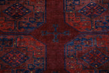 Antique Turkmen rug in a living room setting, pile rug, Turkish rug, vintage rug, portland, rug shop, bright colors, wild shaman, soft rug, bold color, Portland, Oregon, rug store, rug shop, local shop, antique rug