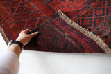 Antique Turkmen rug in a living room setting, pile rug, Turkish rug, vintage rug, portland, rug shop, bright colors, wild shaman, soft rug, bold color, Portland, Oregon, rug store, rug shop, local shop, antique rug