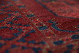 Antique Turkmen rug in a living room setting, pile rug, Turkish rug, vintage rug, portland, rug shop, bright colors, wild shaman, soft rug, bold color, Portland, Oregon, rug store, rug shop, local shop, antique rug