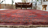 Antique Turkmen rug in a living room setting, pile rug, Turkish rug, vintage rug, portland, rug shop, bright colors, wild shaman, soft rug, bold color, Portland, Oregon, rug store, rug shop, local shop, antique rug
