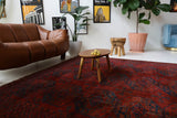 Antique Turkmen rug in a living room setting, pile rug, Turkish rug, vintage rug, portland, rug shop, bright colors, wild shaman, soft rug, bold color, Portland, Oregon, rug store, rug shop, local shop, antique rug