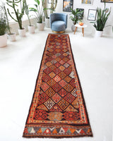 Vintage Turkish runner rug in a living room setting, pile rug, Turkish rug, vintage rug, portland, rug shop, bright colors, wild shaman, soft rug, bold color, Portland, Oregon, rug store, rug shop, local shop
