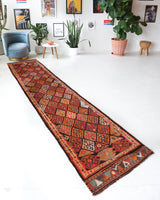 Vintage Turkish runner rug in a living room setting, pile rug, Turkish rug, vintage rug, portland, rug shop, bright colors, wild shaman, soft rug, bold color, Portland, Oregon, rug store, rug shop, local shop