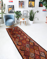 Vintage Turkish runner rug in a living room setting, pile rug, Turkish rug, vintage rug, portland, rug shop, bright colors, wild shaman, soft rug, bold color, Portland, Oregon, rug store, rug shop, local shop