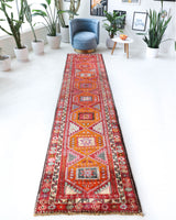 Vintage Turkish runner rug in a living room setting, pile rug, Turkish rug, vintage rug, portland, rug shop, bright colors, wild shaman, soft rug, bold color, Portland, Oregon, rug store, rug shop, local shop