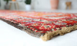Vintage Turkish runner rug in a living room setting, pile rug, Turkish rug, vintage rug, portland, rug shop, bright colors, wild shaman, soft rug, bold color, Portland, Oregon, rug store, rug shop, local shop