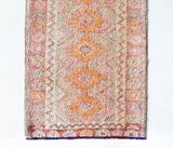 Vintage Turkish runner rug in living room setting, old rug, antique rug, pastel colors, faded colors, Turkish rug, vintage rug, soft rug, Portland, Oregon, rug store, rug shop, local shop