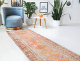 Vintage Turkish runner rug in living room setting, old rug, antique rug, pastel colors, faded colors, Turkish rug, vintage rug, soft rug, Portland, Oregon, rug store, rug shop, local shop