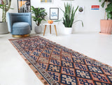 Vintage Turkish runner rug in living room setting, old rug, antique rug, pastel colors, faded colors, Turkish rug, vintage rug, soft rug, Portland, Oregon, rug store, rug shop, local shop